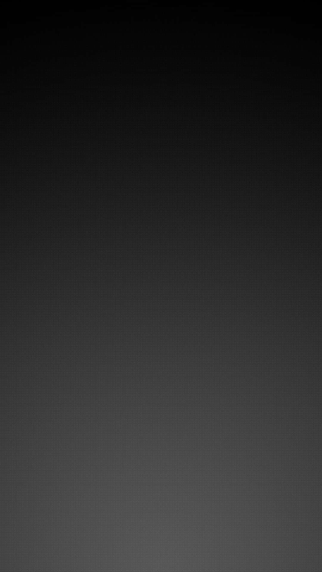 Dark Grey 桌布 壁紙 — 一款極簡漸層桌布，從深黑色過渡到深灰色，帶有微妙的像素紋理。