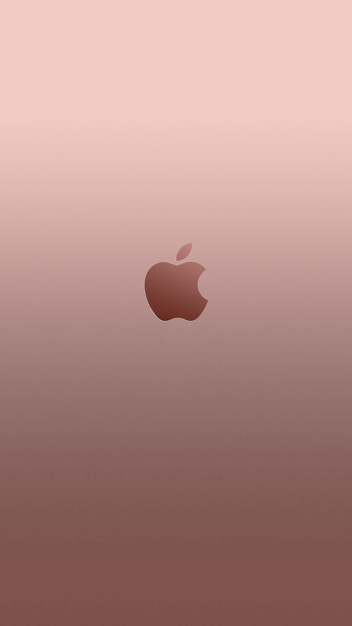 玫瑰金 iPhone 桌布 壁紙 — 一款極簡漸變桌布，中央放置玫瑰金色調的Apple標誌，背景由柔和粉紅漸變至棕色。
