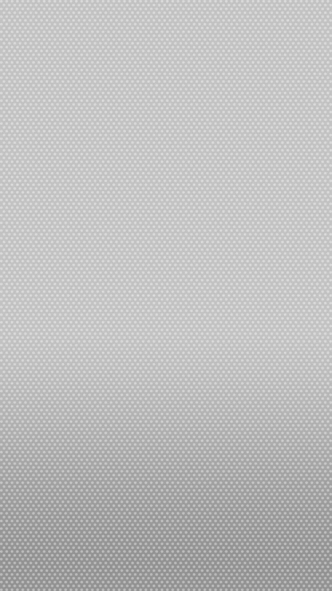 Light Gray iPhone 桌布 壁紙 — 一款極簡灰色漸層桌布，帶有細微的圓點圖案紋理。
