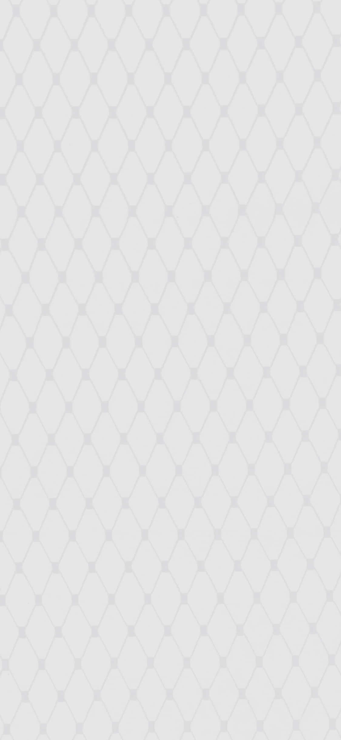 Light Gray iPhone 桌布 壁紙 — 一款極簡風格的桌布，在柔和的白色背景上帶有微妙的淺灰色菱形網格圖案。