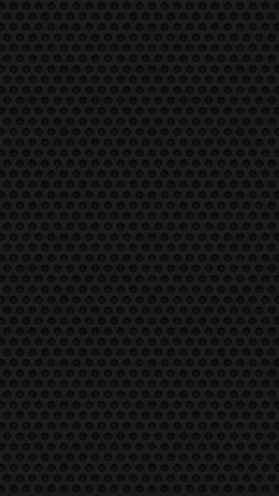 Dark Phone 桌布 壁紙 — 一款極簡黑色壁紙，表面帶有微妙的重複穿孔圖案。