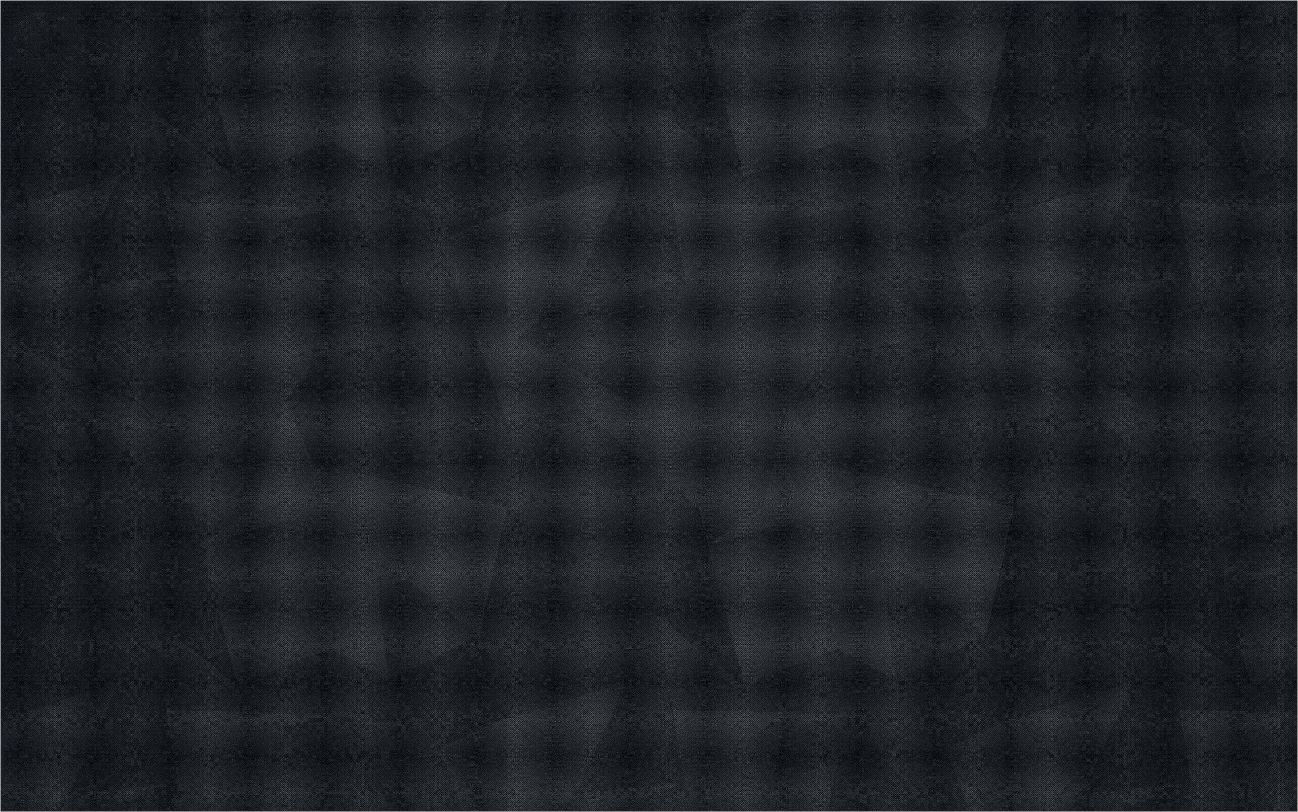 Polygon 桌布 壁紙 — 一款深色抽象壁紙，帶有幾何三角形圖案，採用不同深淺的黑色和炭灰色。