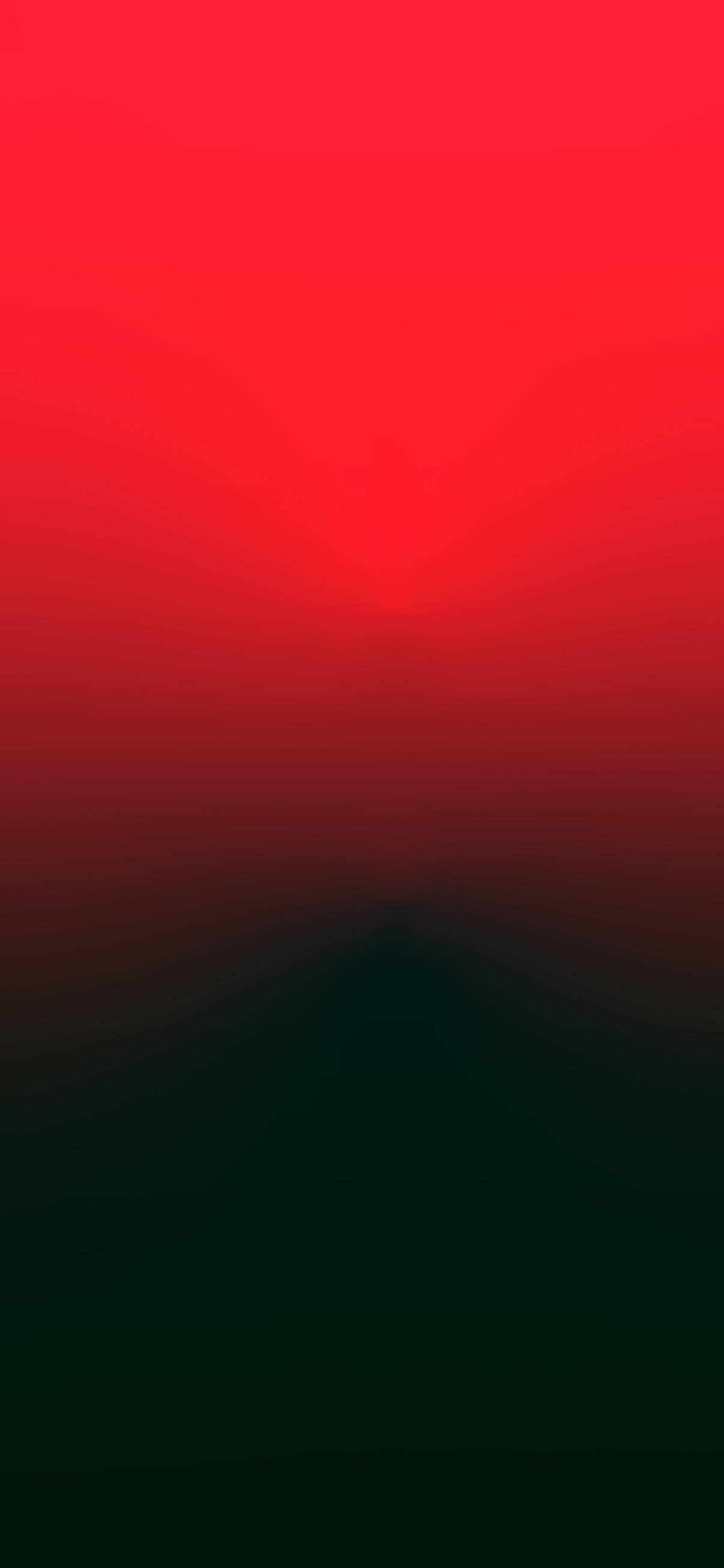 Red And Black iPhone 桌布 壁紙 — 一款漸層桌布，從頂部的鮮紅色過渡到底部的深黑色，帶有柔和的模糊邊緣。