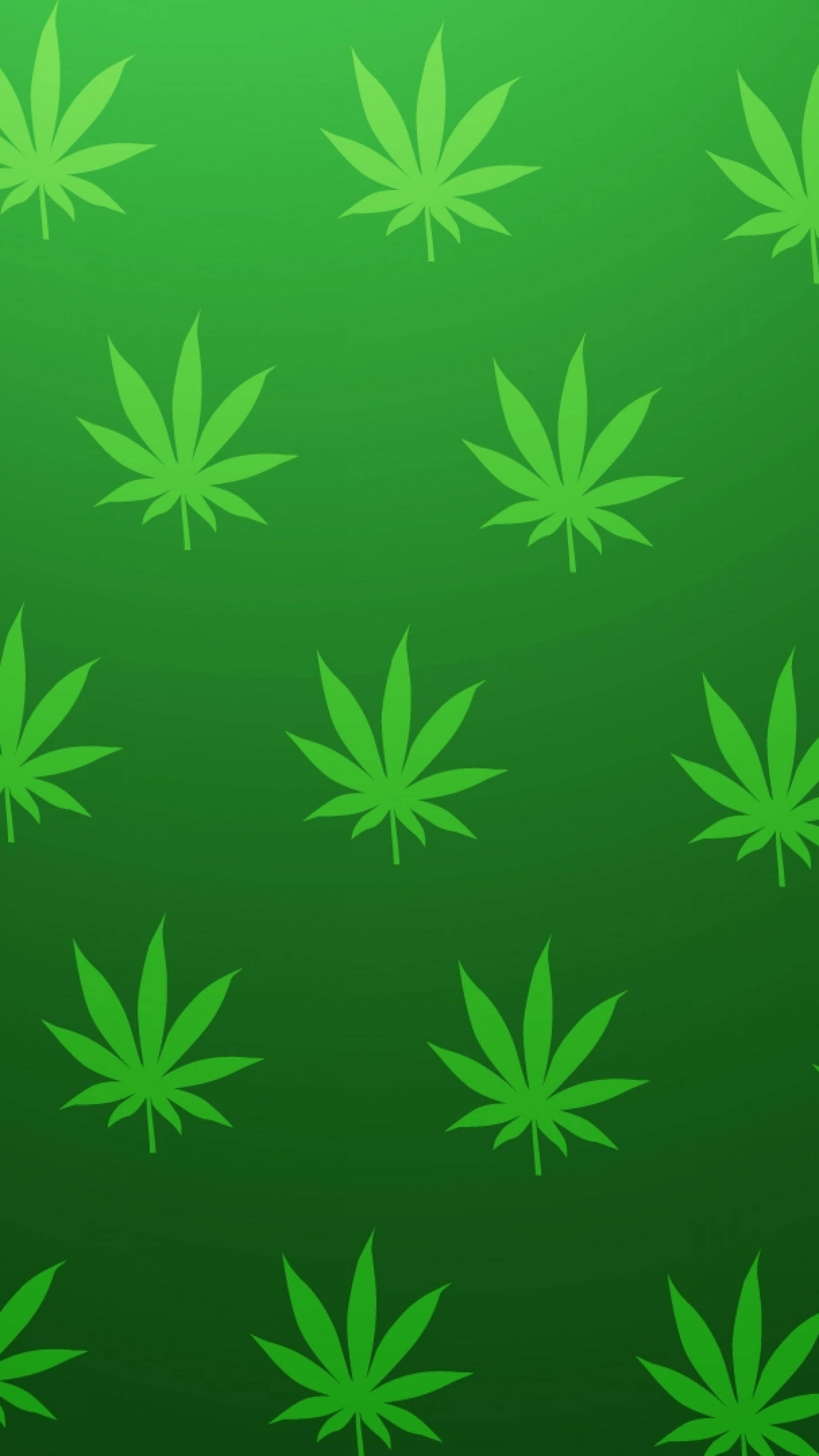 Leaves 桌布 壁紙 — 一款漸層綠色桌布，以重複的大麻葉剪影為特色，呈現不同深淺的綠色。