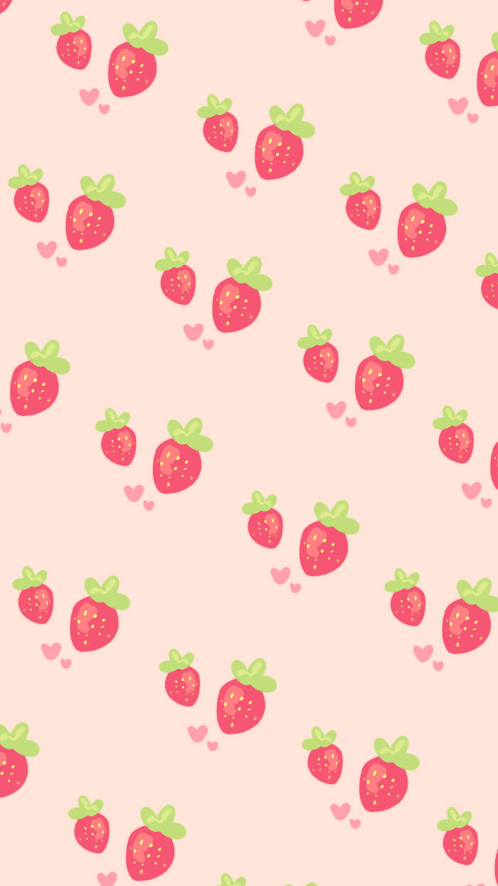Strawberry Aesthetic 桌布 壁紙 — 一款粉紅色粉彩壁紙，表面散落著可愛的卡通草莓和小愛心。