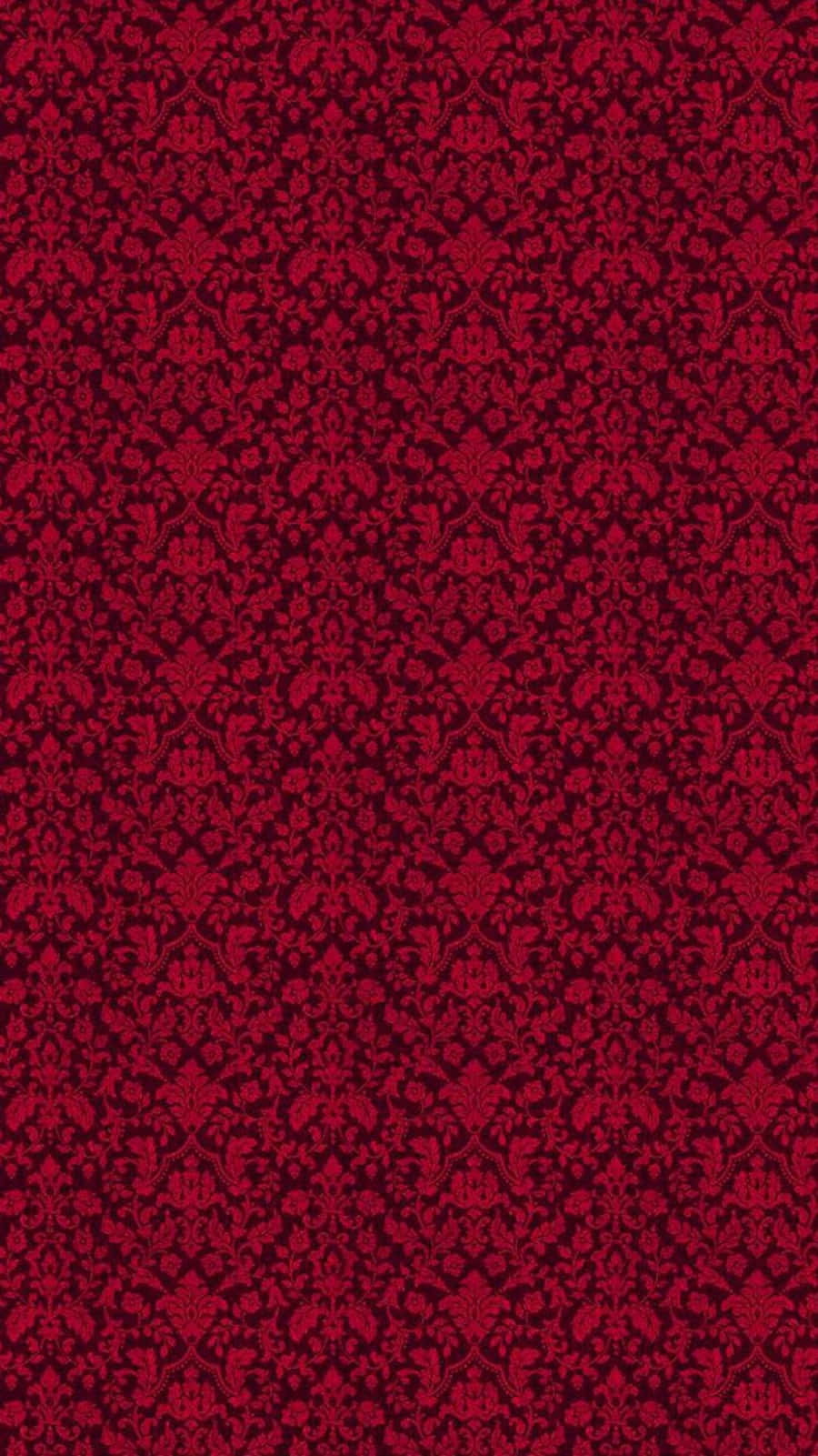 Red Abstract 桌布 壁紙 — 一款豐富的紅色錦緞壁紙，在深紅色的背景上重複著複雜的花卉和藤蔓圖案。
