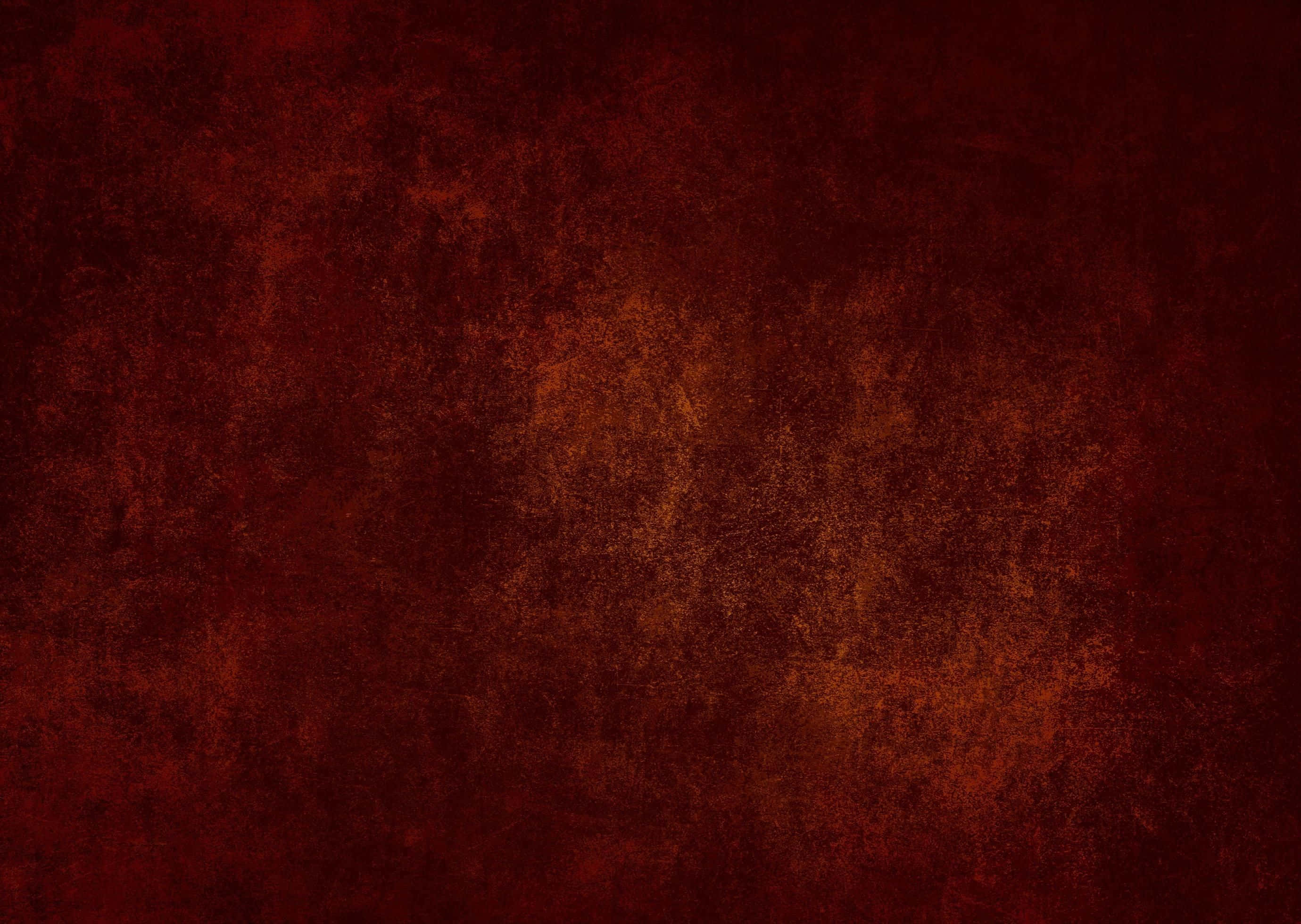texture 桌布 壁紙 — 一款質感豐富的壁紙，採用深紅色和焦橙色調，帶有微妙的斑駁圖案。