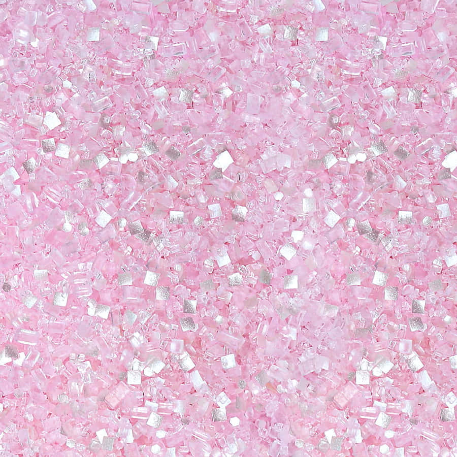 Light Pink Glitter 桌布 壁紙 — 一片密集的粉紅色和銀色方形亮片碎片，營造出閃閃發光的紋理表面。