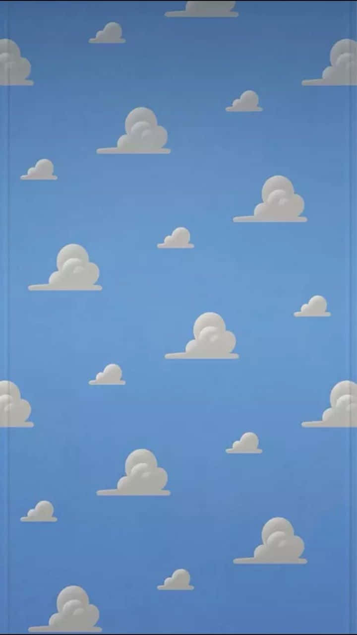 柔軟的白色卡通雲朵在平靜的藍天上飄移。 — 玩具總動員 GIF 壁紙
