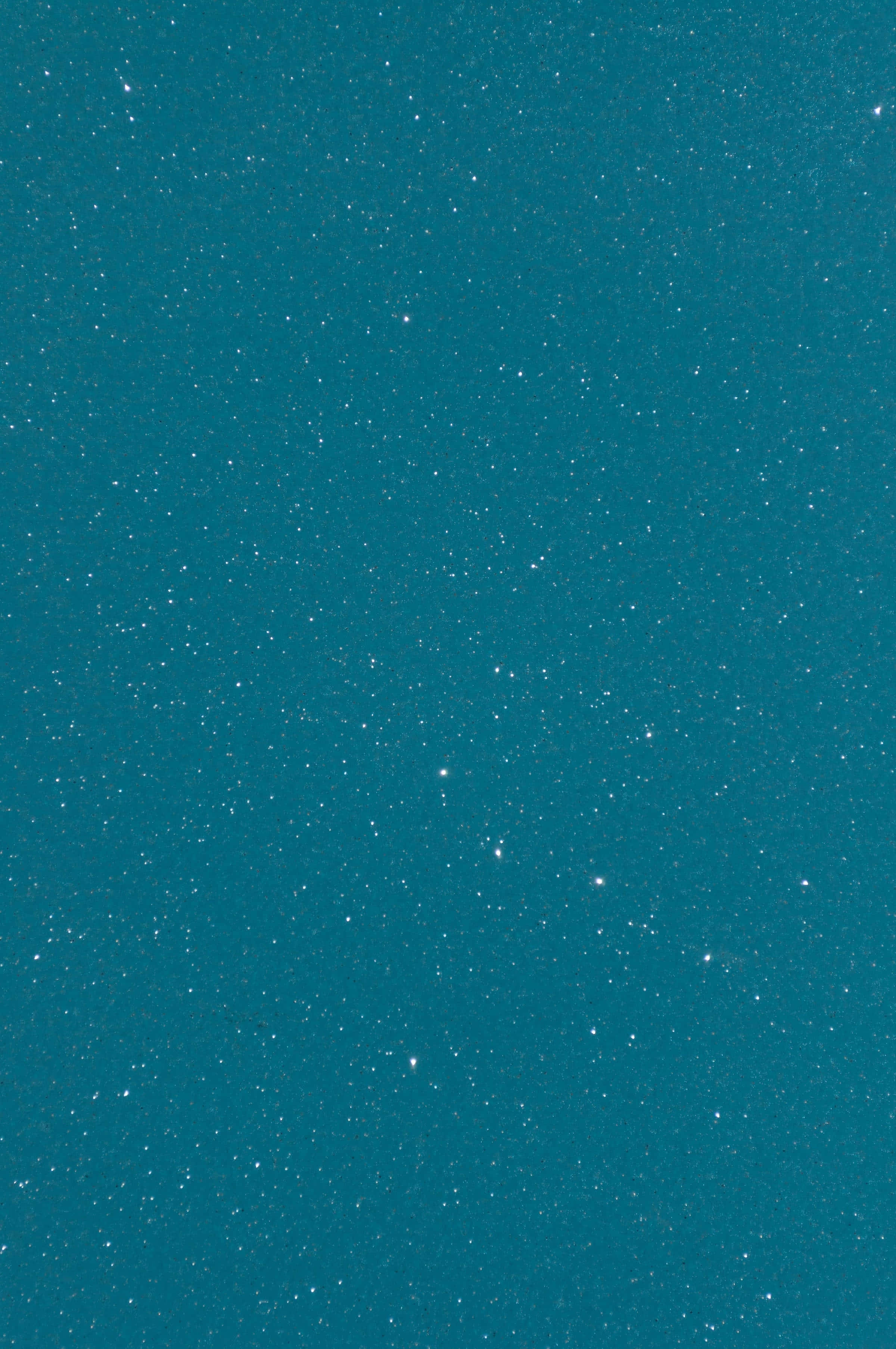 Plain Aesthetic 桌布 壁紙 — 一片寧靜的藍綠色夜空，點綴著無數閃爍的星星，營造出平靜的宇宙背景。