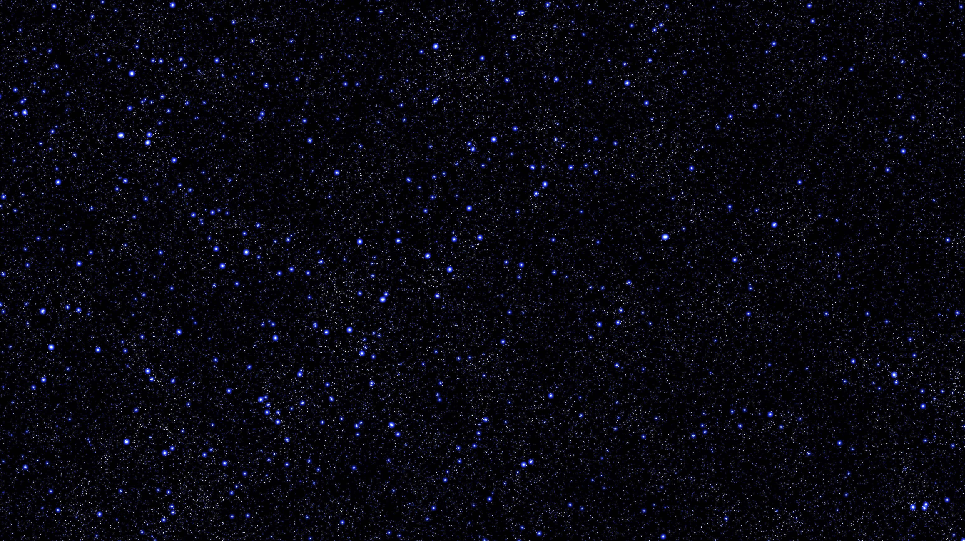 Star Sky 桌布 壁紙 — 一片廣闊的發光藍色星星散落在深邃的黑色宇宙空間中。