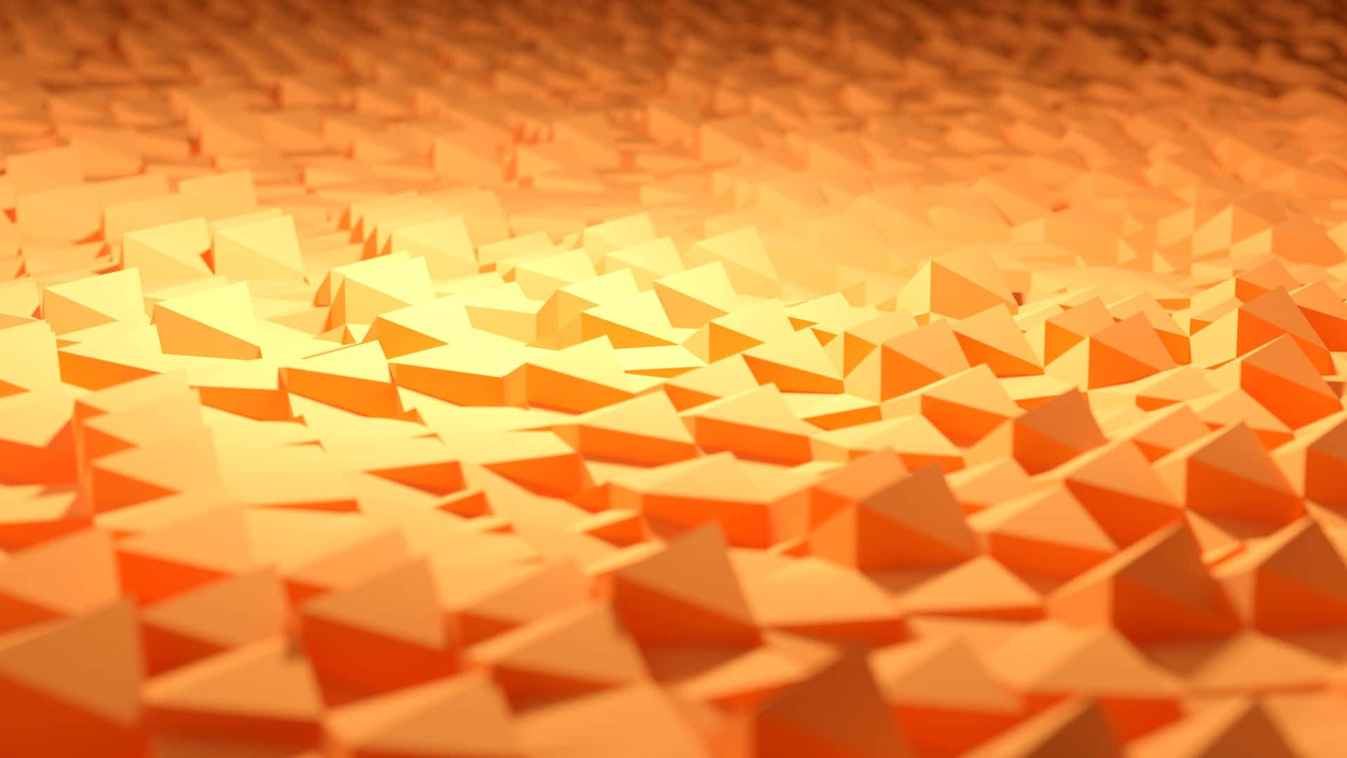 Geometric Desktop 桌布 壁紙 — 一片發光的橙色幾何三角形創造出一個溫暖的抽象風景，帶有柔和的景深。