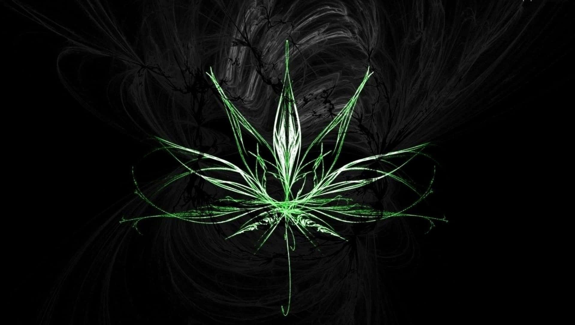  壁紙 — 一片發光的綠色大麻葉在旋轉的黑灰碎形背景中散發光芒。