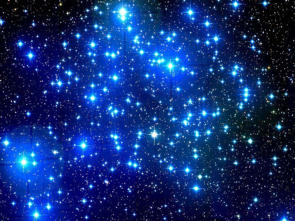 Beautiful Star 桌布 壁紙 — 一片耀眼的亮藍星星在深邃宇宙黑色背景上閃爍。