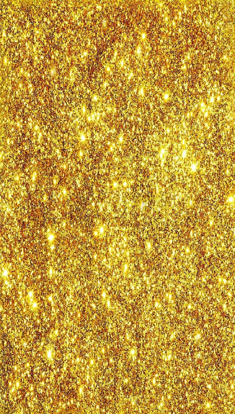 High Resolution Gold Glitter 桌布 壁紙 — 一片閃耀的金色亮粉場地，整個畫面佈滿明亮閃光。