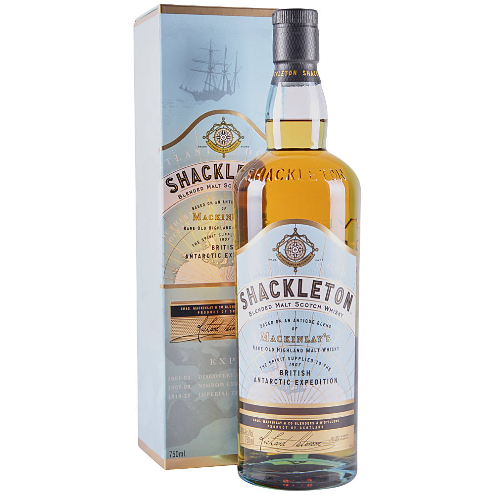 Drink 桌布 壁紙 — 一瓶Shackleton Blended Malt Scotch Whisky，附有展示船隻和南極探險文字的盒子。
