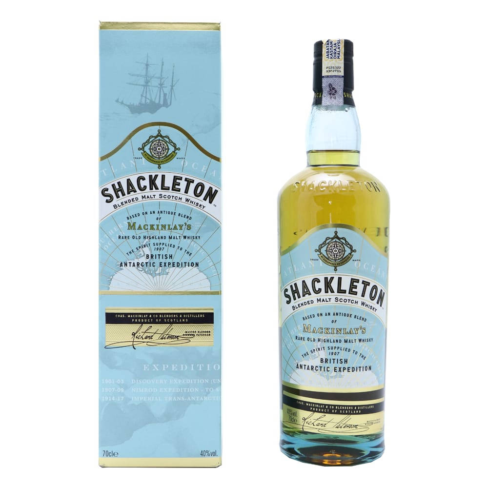 Drink 桌布 壁紙 — 一瓶及盒裝 Shackleton 調和麥芽蘇格蘭威士忌，帶有復古南極探險設計和金色液體。
