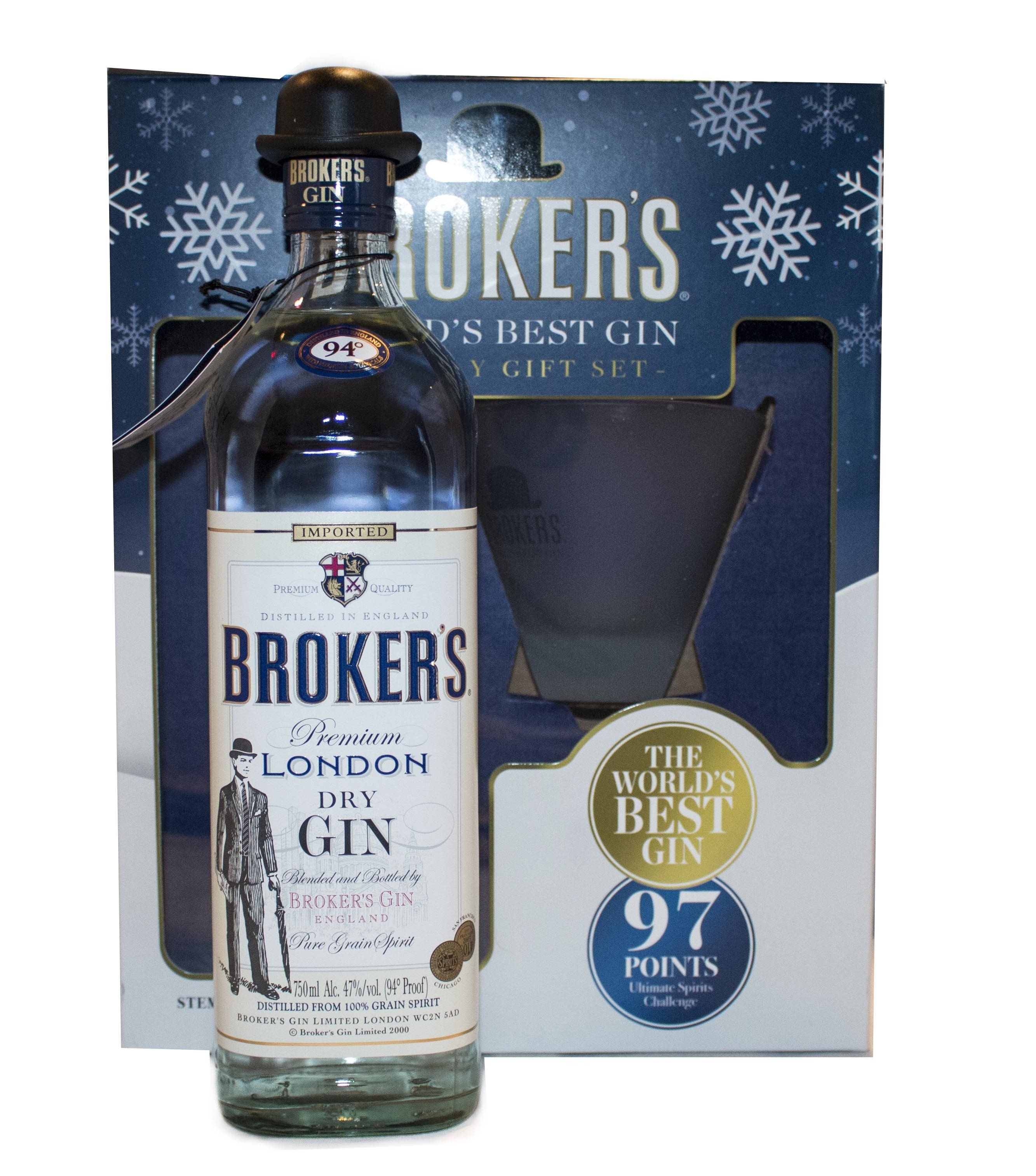 Box 桌布 壁紙 — 一瓶清澈的Broker's Premium London Dry Gin，瓶身帶有復古紳士插圖，放在其藍色雪花主題禮盒前。