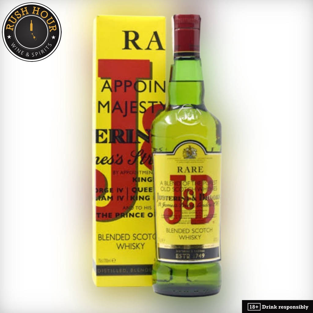 drinks 桌布 壁紙 — 一瓶綠色玻璃瓶的Rare調和蘇格蘭威士忌，旁邊是其鮮黃色盒子，帶有粗體紅色字體，背景為純白色。
