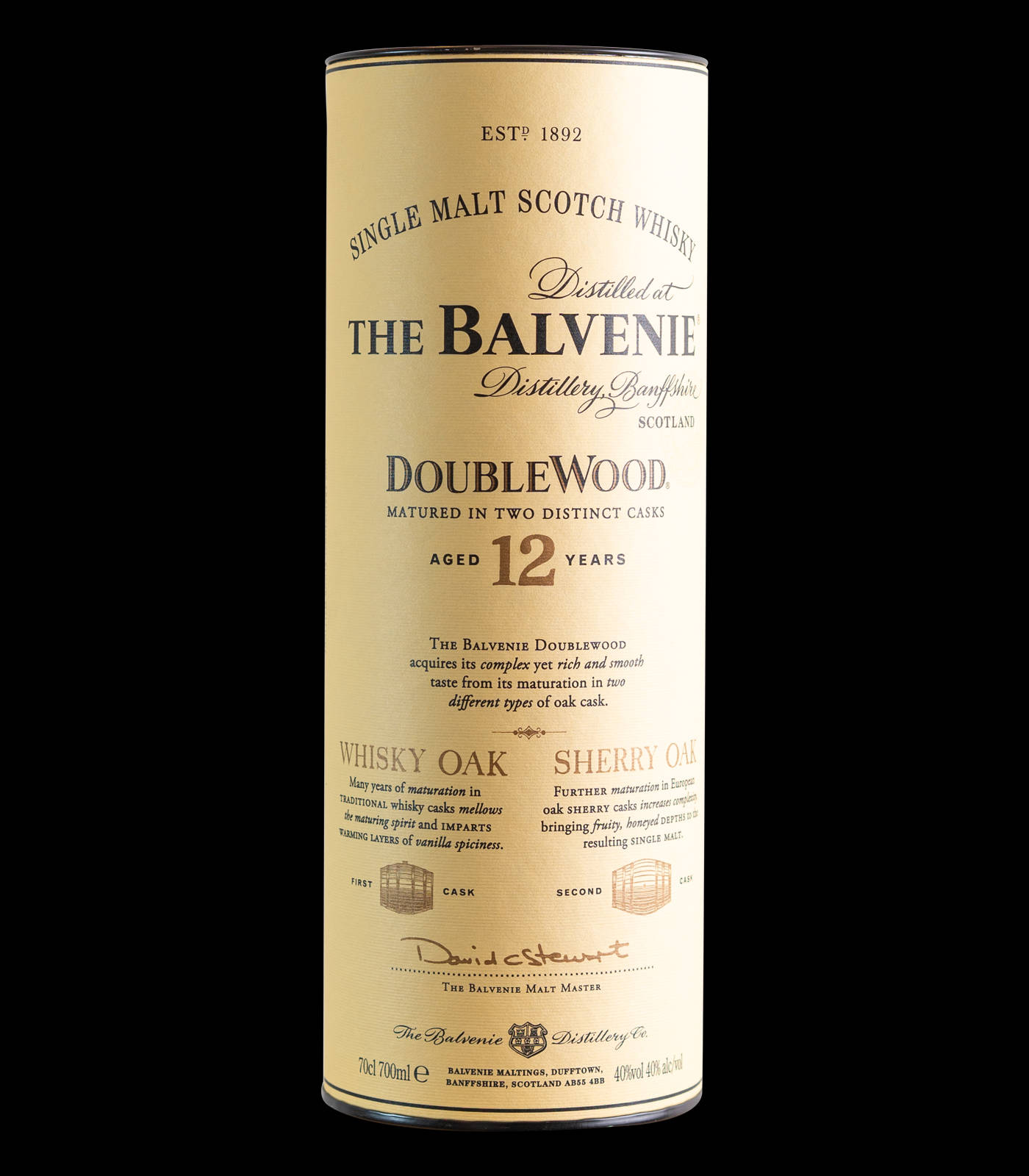 Drink 桌布 壁紙 — 一瓶高身米色圓柱形的 The Balvenie DoubleWood 12 Year Old Single Malt Scotch Whisky 豎立在純黑色背景前。