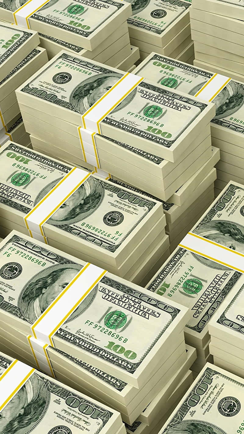 Bills 桌布 壁紙 — 一疊疊捆紮好的百元美鈔填滿畫面，呈現密集而有序的金融展示。