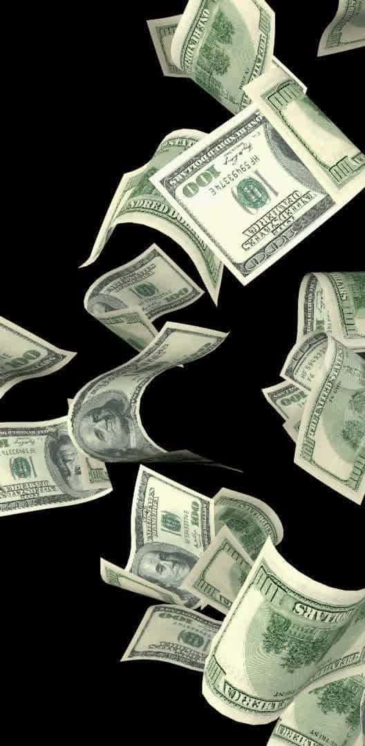Falling Money 桌布 壁紙 — 一百美元鈔票在純黑背景上動態地層層疊落，營造出突如其來的財富與奢華感。