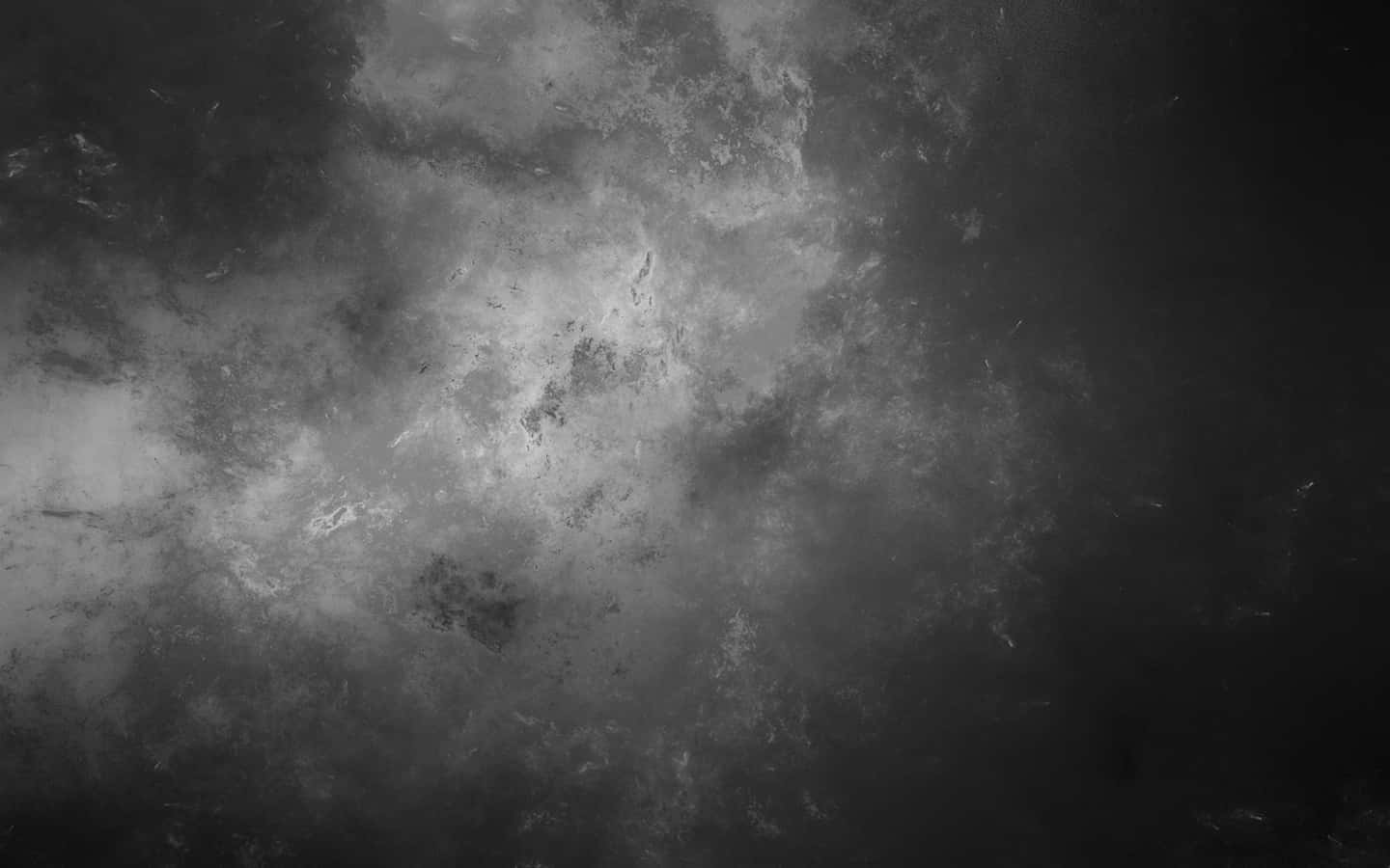Black And Gray 桌布 壁紙 — 一種戲劇性的單色抽象紋理，帶有旋轉的灰色雲層和深色陰影，營造出陰鬱的氛圍效果。