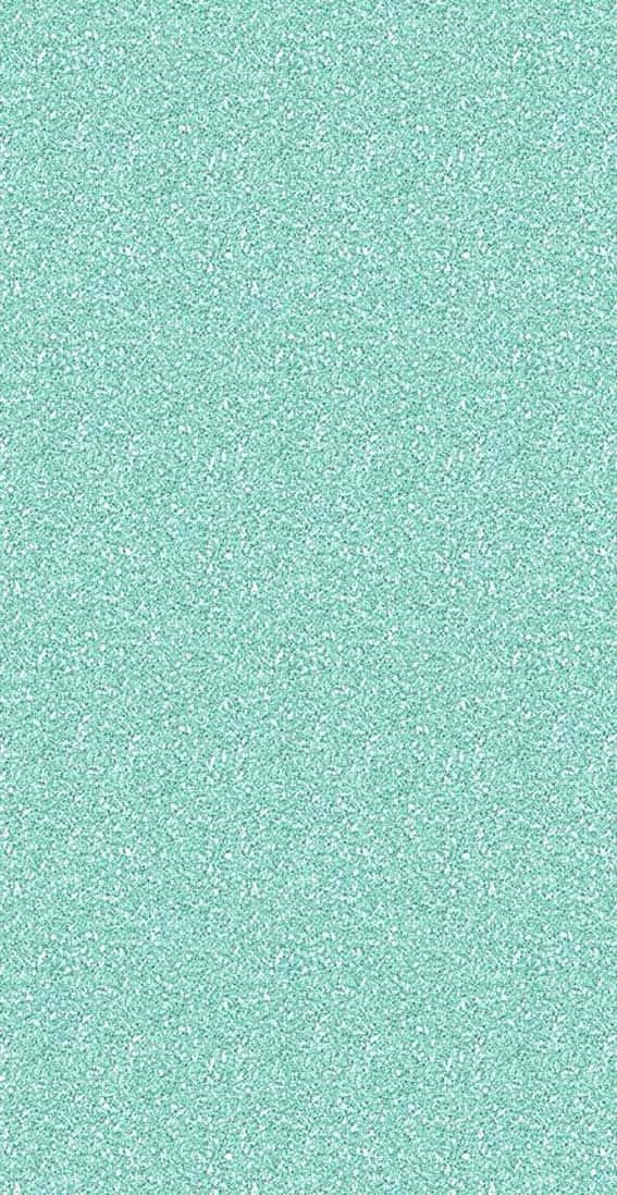 Seafoam Green 桌布 壁紙 — 一種舒緩的薄荷綠色背景，帶有微妙的白色斑點，營造出柔軟紋理的壁紙。