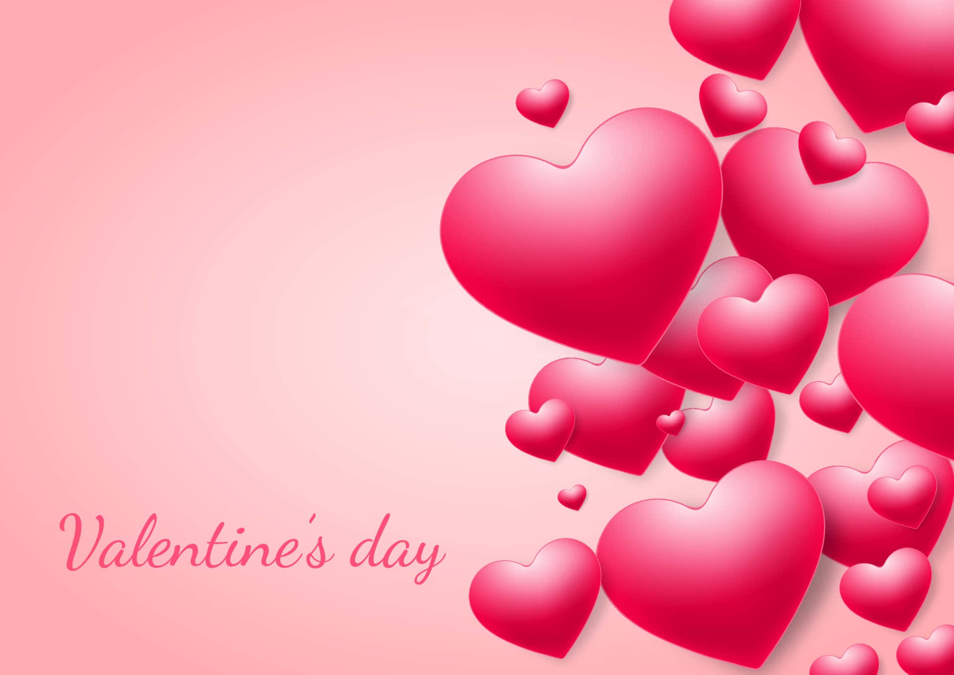 Cute Happy Valentine Day 桌布 壁紙 — 一簇光澤粉紅心形斜向漂浮在柔和的漸變粉紅背景上，下方寫有「Valentine's day」。
