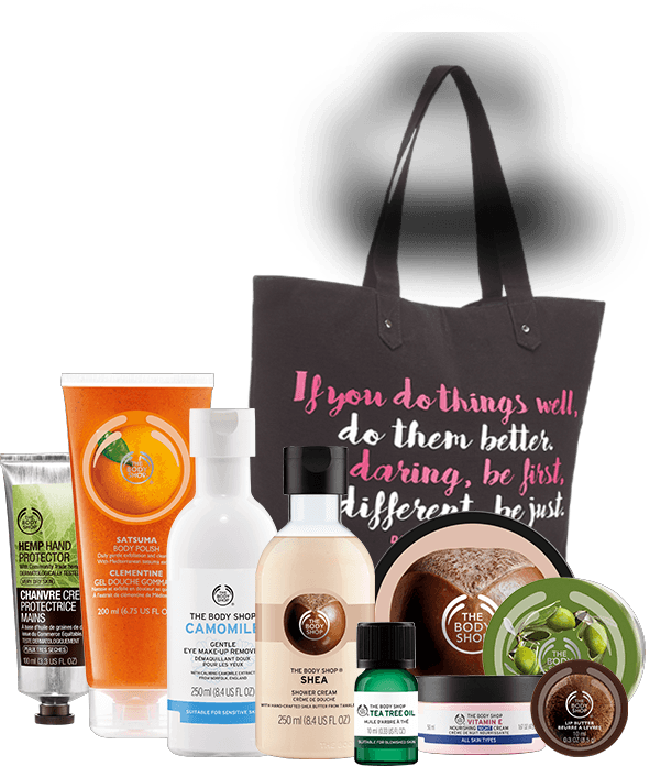 Shopping 桌布 壁紙 — 一系列The Body Shop護膚產品，搭配一個印有勵志文字的黑色手提袋。