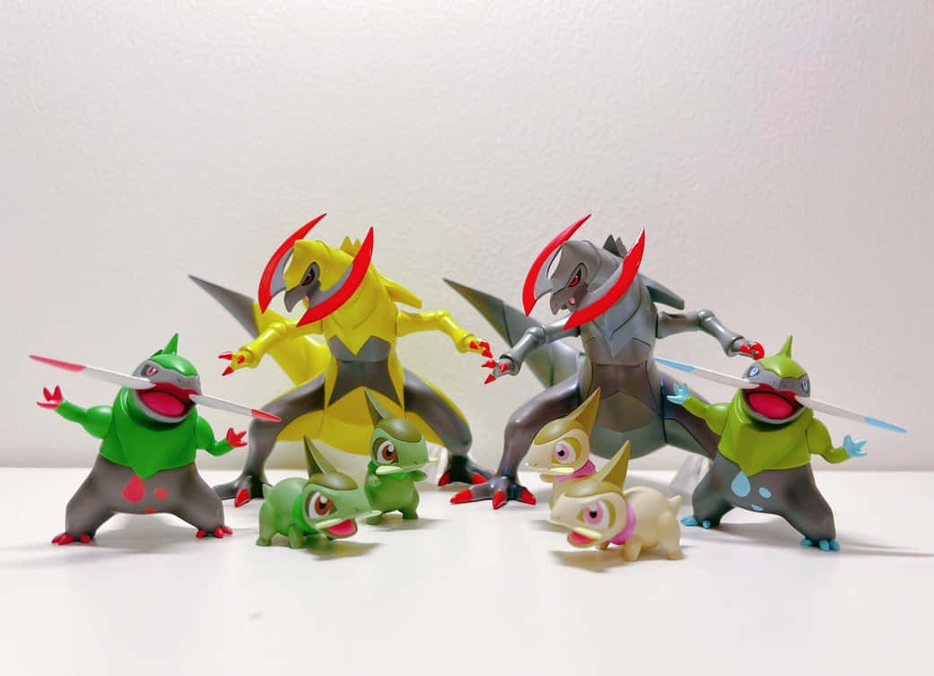 Pokemon Aesthetic 桌布 壁紙 — 一系列色彩繽紛的寶可夢動作人偶，在純白色背景上動態擺出姿勢。