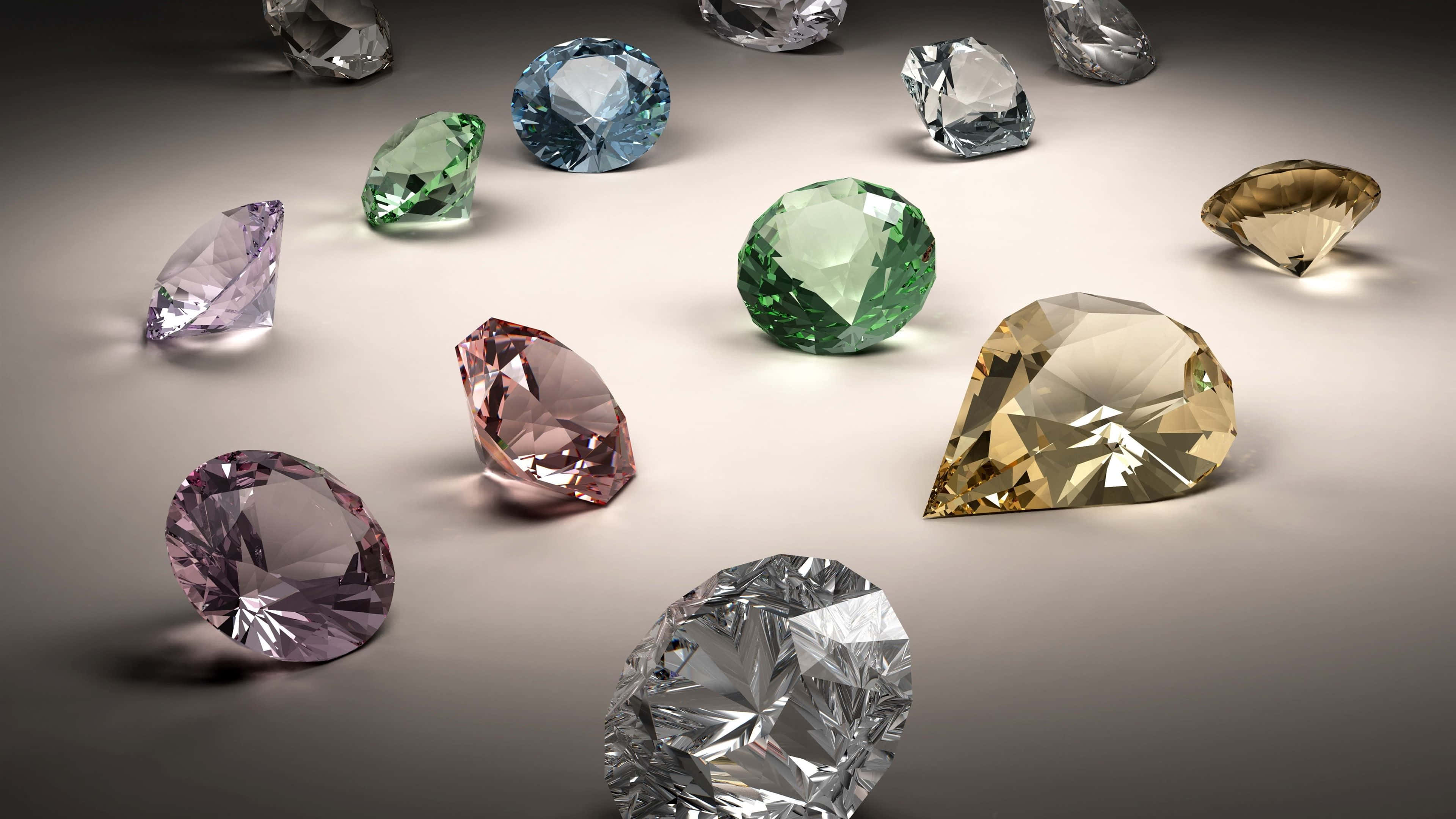 Jewelry Design 桌布 壁紙 — 一系列色彩鮮豔的刻面寶石散落在柔和的漸變表面上。