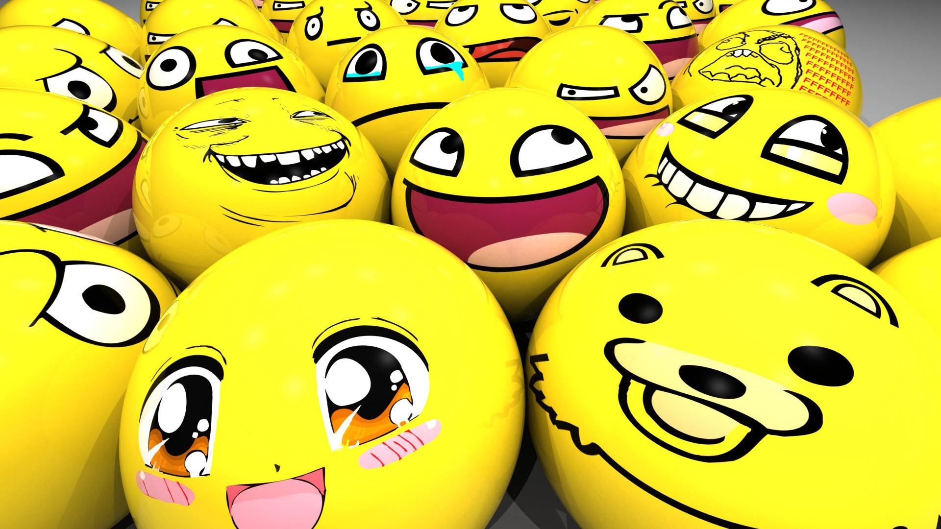 faces 桌布 壁紙 — 一組充滿活力的光澤黃色表情符號球體，展現誇張的卡通表情。