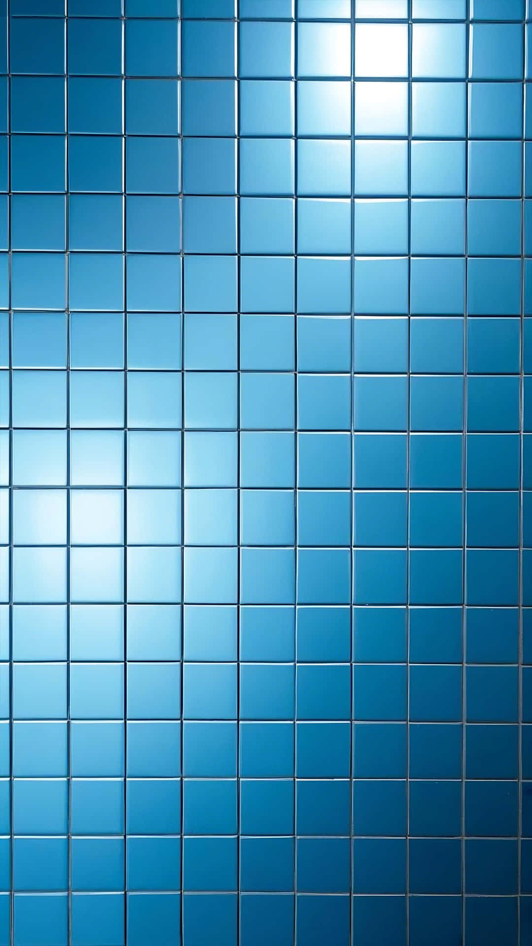 abstract grid of soft blue reflective square tiles 壁紙 — 一組光滑的藍色方形瓷磚排列成網格，反射光線，形成從亮藍色到深藍色的冷色漸變。