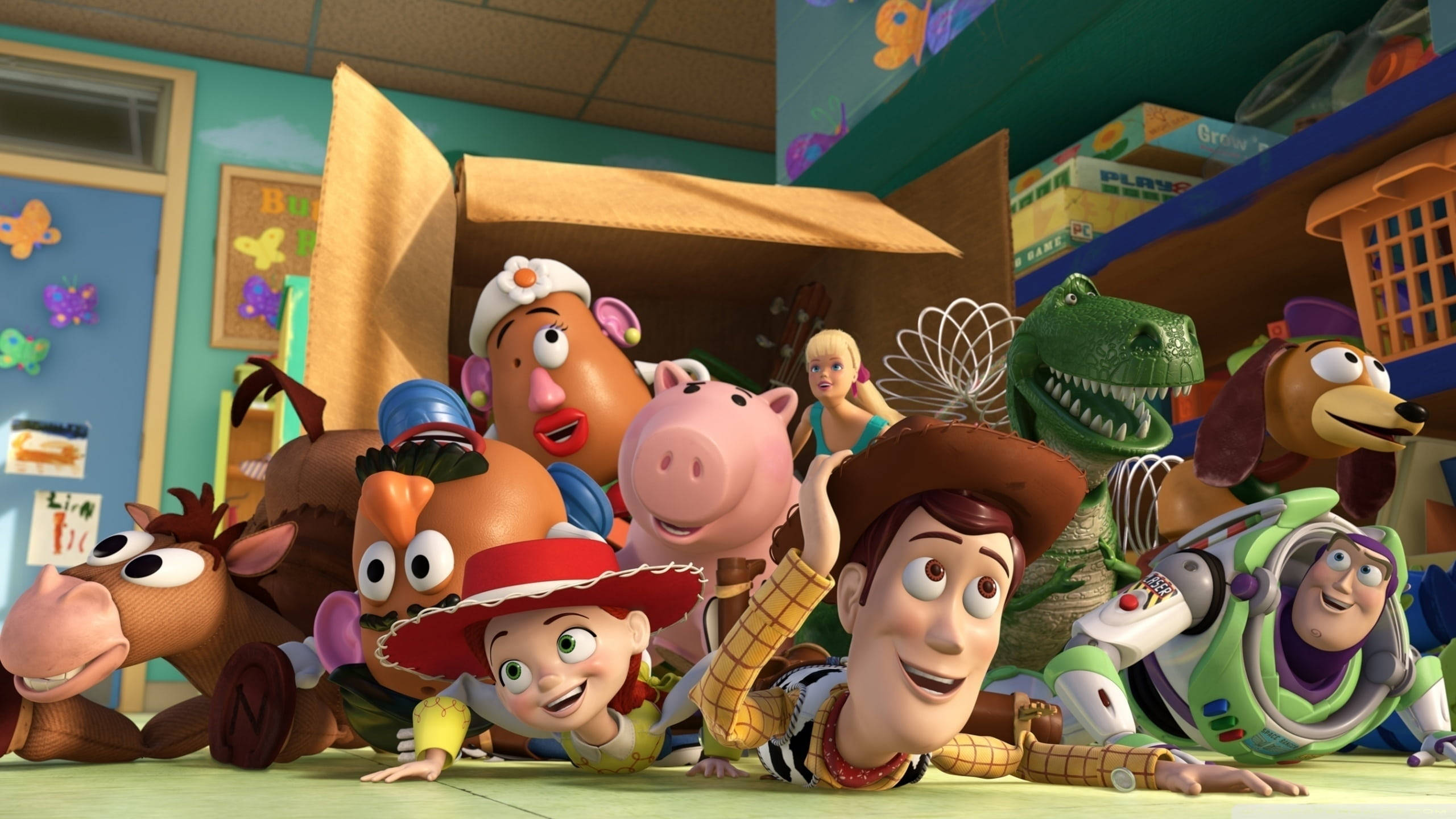 Toy Story 3 桌布 壁紙 — 一組色彩繽紛的3D渲染《玩具總動員》心愛玩具角色，從紙箱中探出頭來，置身於色彩繽紛的兒童房。