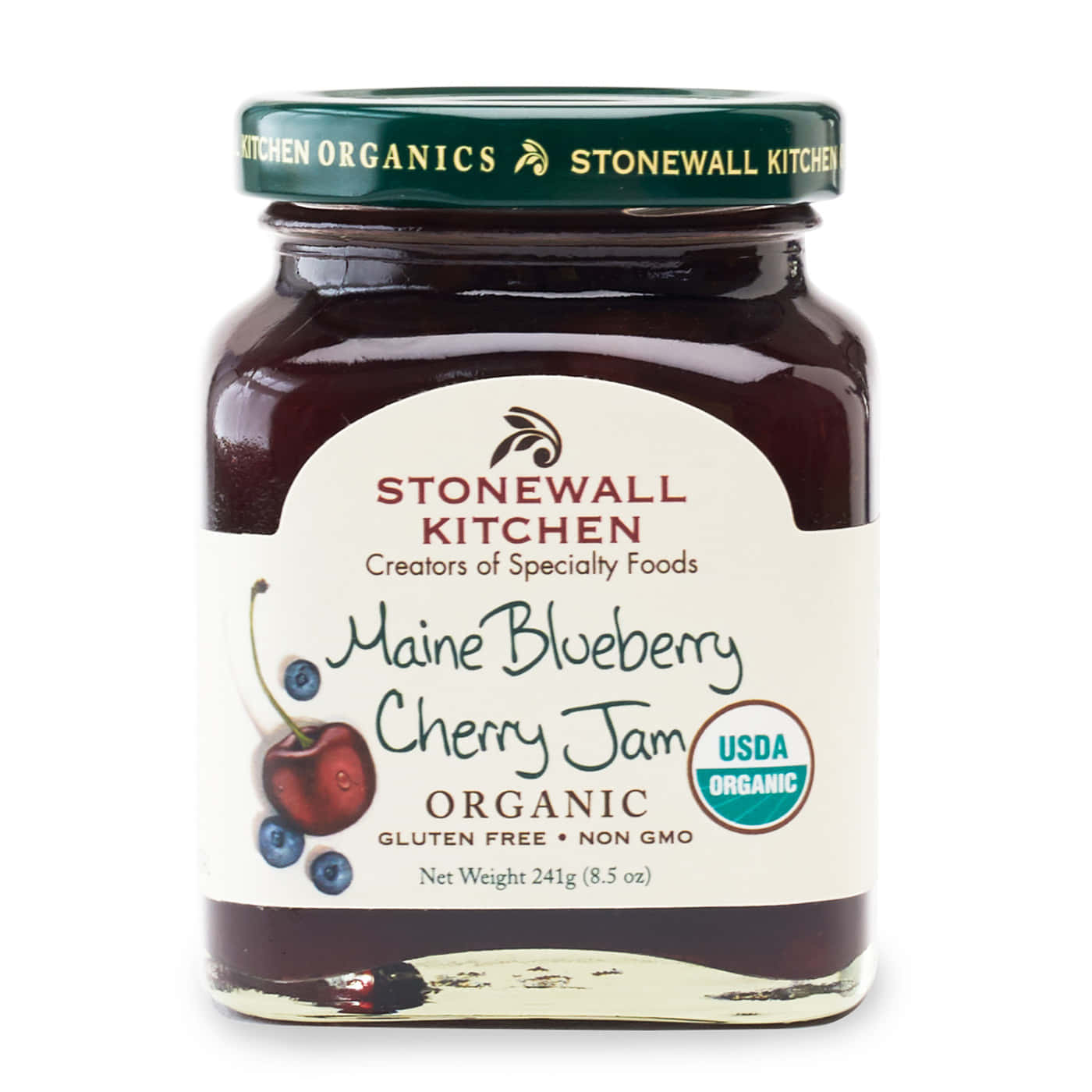 Blueberry Jam 桌布 壁紙 — 一罐Stonewall Kitchen Maine藍莓櫻桃果醬，帶有綠色蓋子和白色標籤，顯示有機認證和水果插圖。