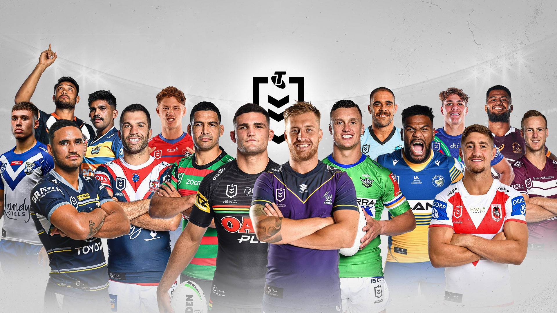 Nrl 桌布 壁紙 — 一群充滿活力的橄欖球聯賽球員穿著色彩繽紛的球隊球衣，在明亮的攝影棚背景下自信地擺姿勢。