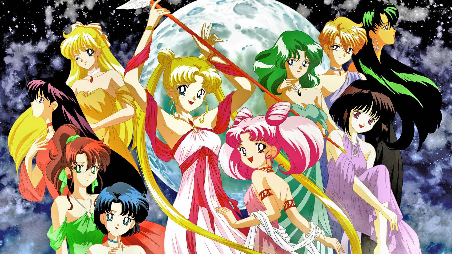 美少女戰士 桌布 壁紙 — 一群充滿活力的美少女戰士動畫角色在繁星點點的夜空下英勇地擺姿勢，背後有一輪巨大的月亮。