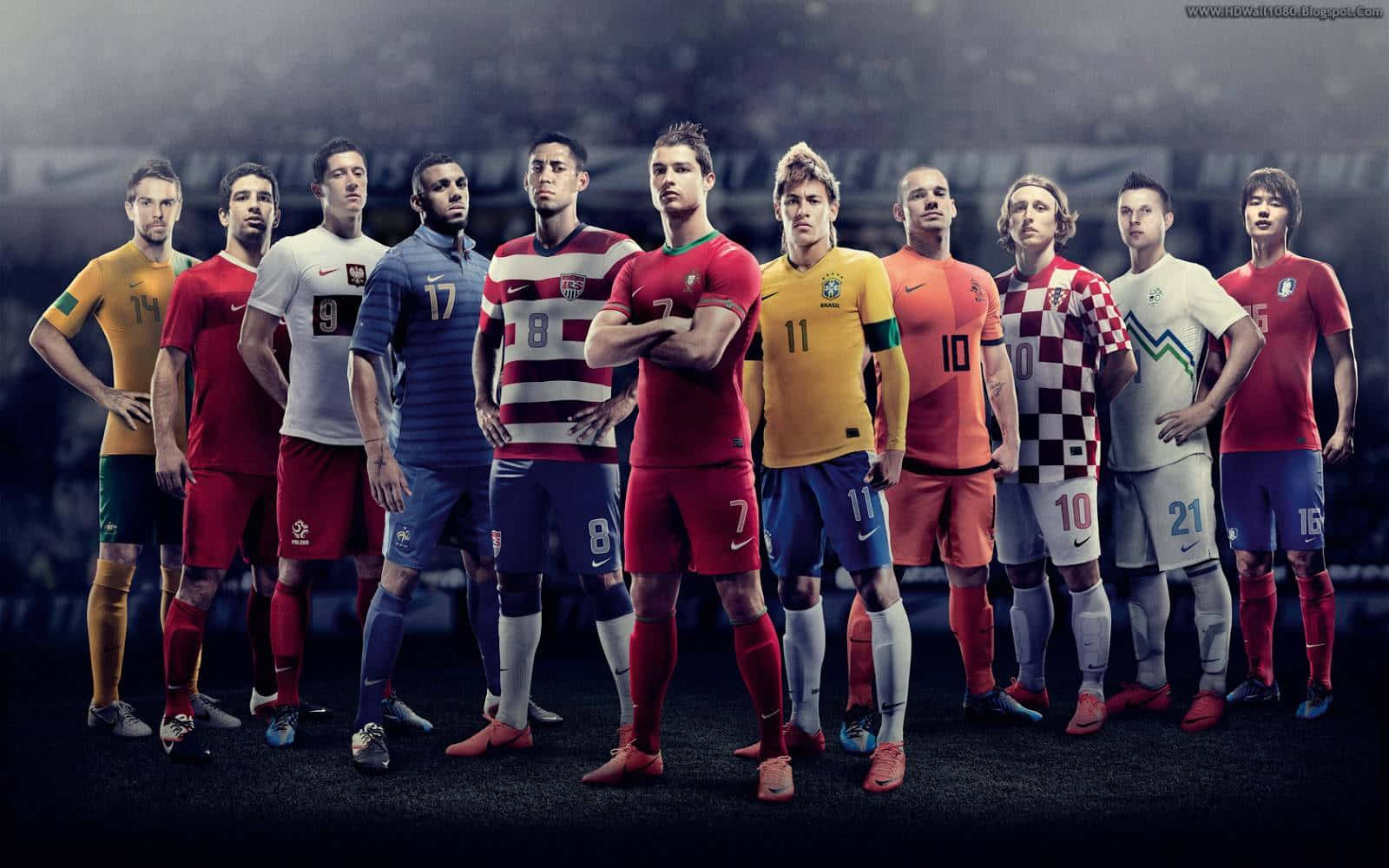 Fifa 22 桌布 壁紙 — 一群國際足球運動員身穿國家隊球衣，在戲劇性燈光下自信地站在球場上。