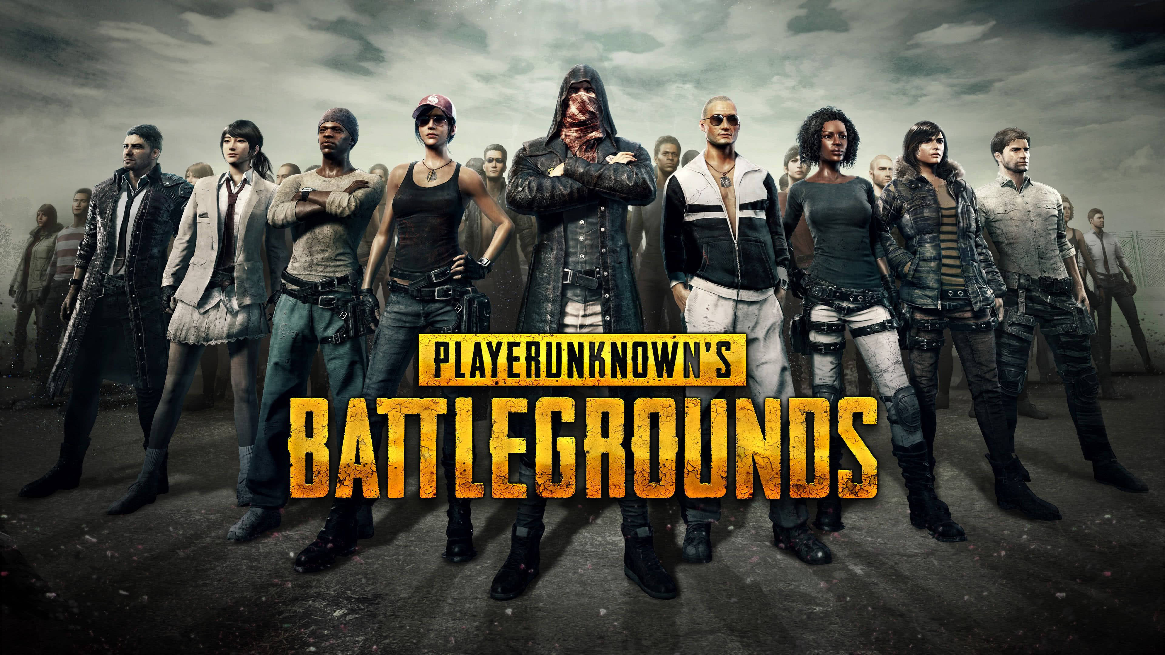 絕地求生 桌布 壁紙 — 一群多元化的 battle royale 玩家身穿戰術裝備，在暴風雨的天空下自信地站立，下方有 PUBG 標誌發光。