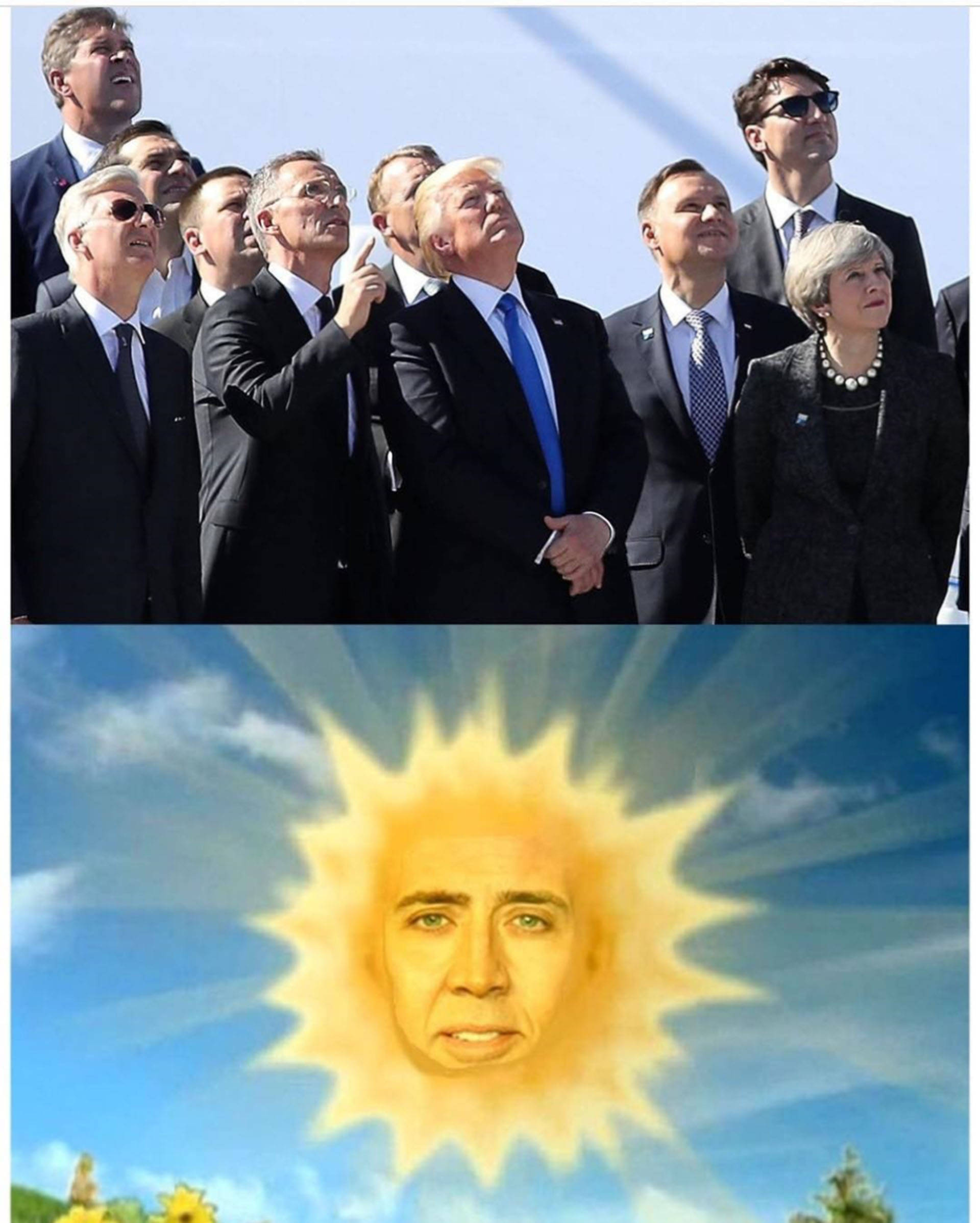 nicolas cage meme 桌布 壁紙 — 一群穿著西裝的世界領袖抬頭仰望，一個帶有尼可拉斯·凱吉臉孔的卡通太陽從藍天中照耀下來。