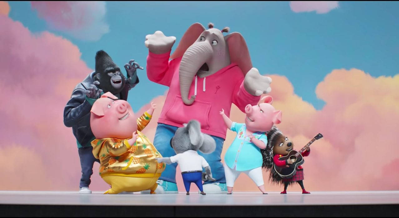Animation 桌布 壁紙 — 一群色彩繽紛的擬人化動物，穿著鮮豔的服裝，在粉彩天空背景下快樂地擺姿勢。