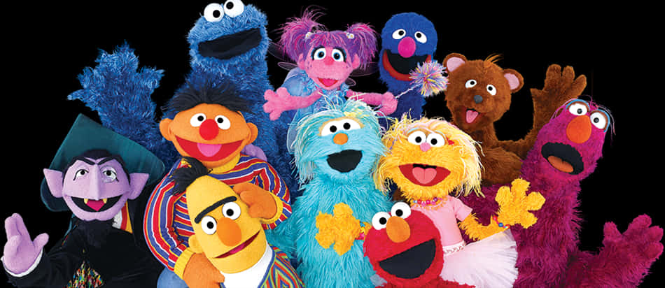 muppets 桌布 壁紙 — 一群色彩繽紛的芝麻街布偶在黑色背景前開心地擺姿勢。