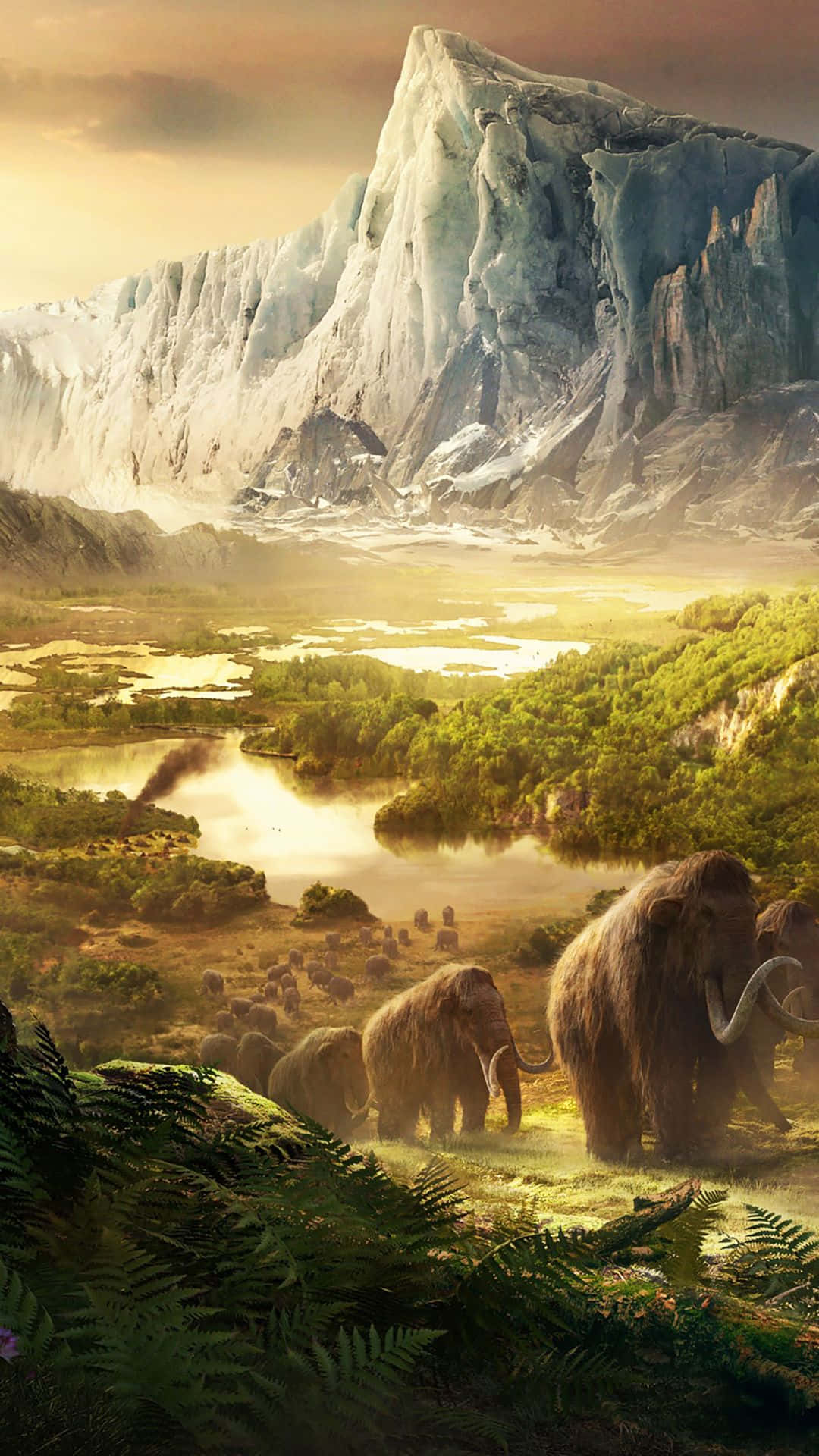 iPhone Xs Far Cry 4 桌布 壁紙 — 一群長毛象在茂盛的山谷中吃草，山谷上方是高聳的冰川，沐浴在金色的夕陽光芒中。