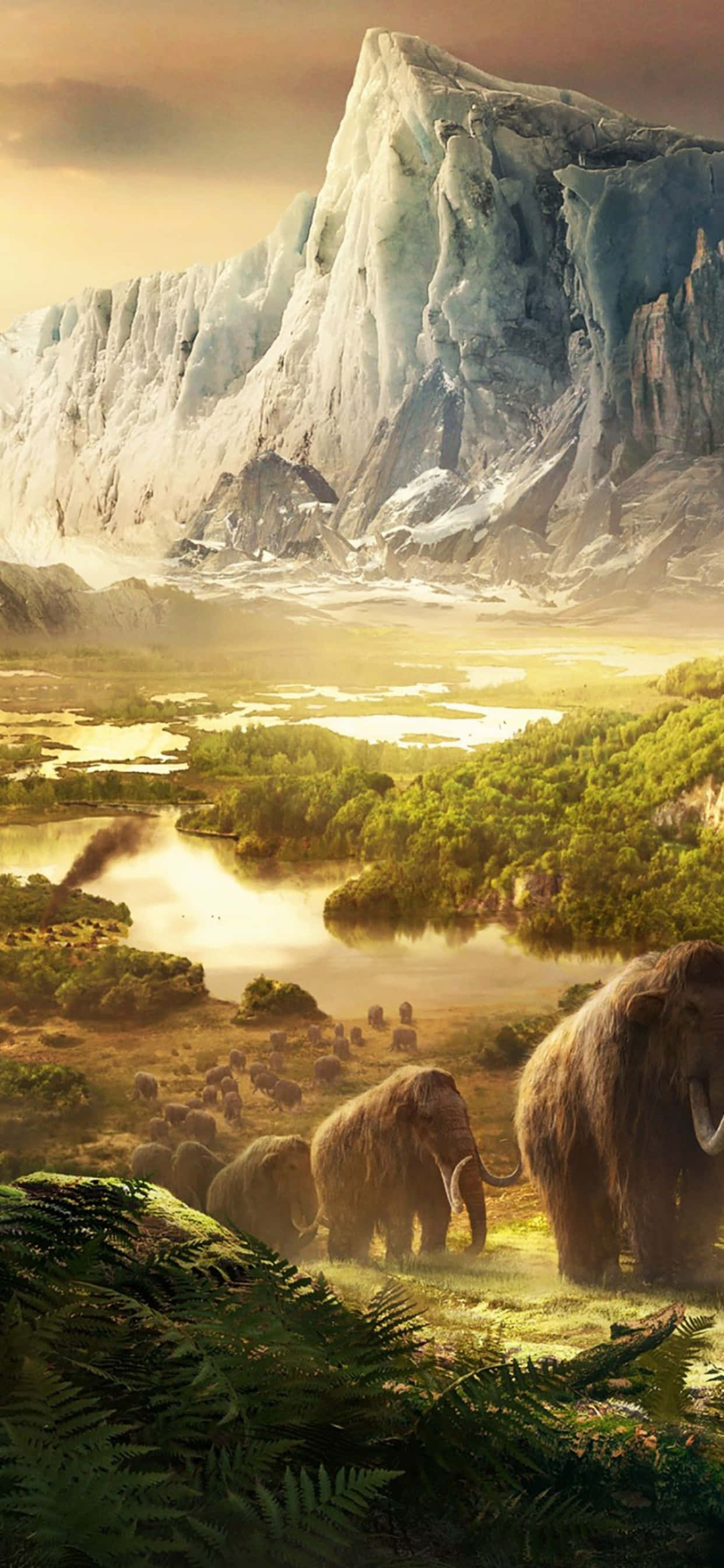 iPhone Xs Max Far Cry 4 桌布 壁紙 — 一群長毛象在陽光照耀的山谷中，在金色天空下高聳的冰川前吃草。