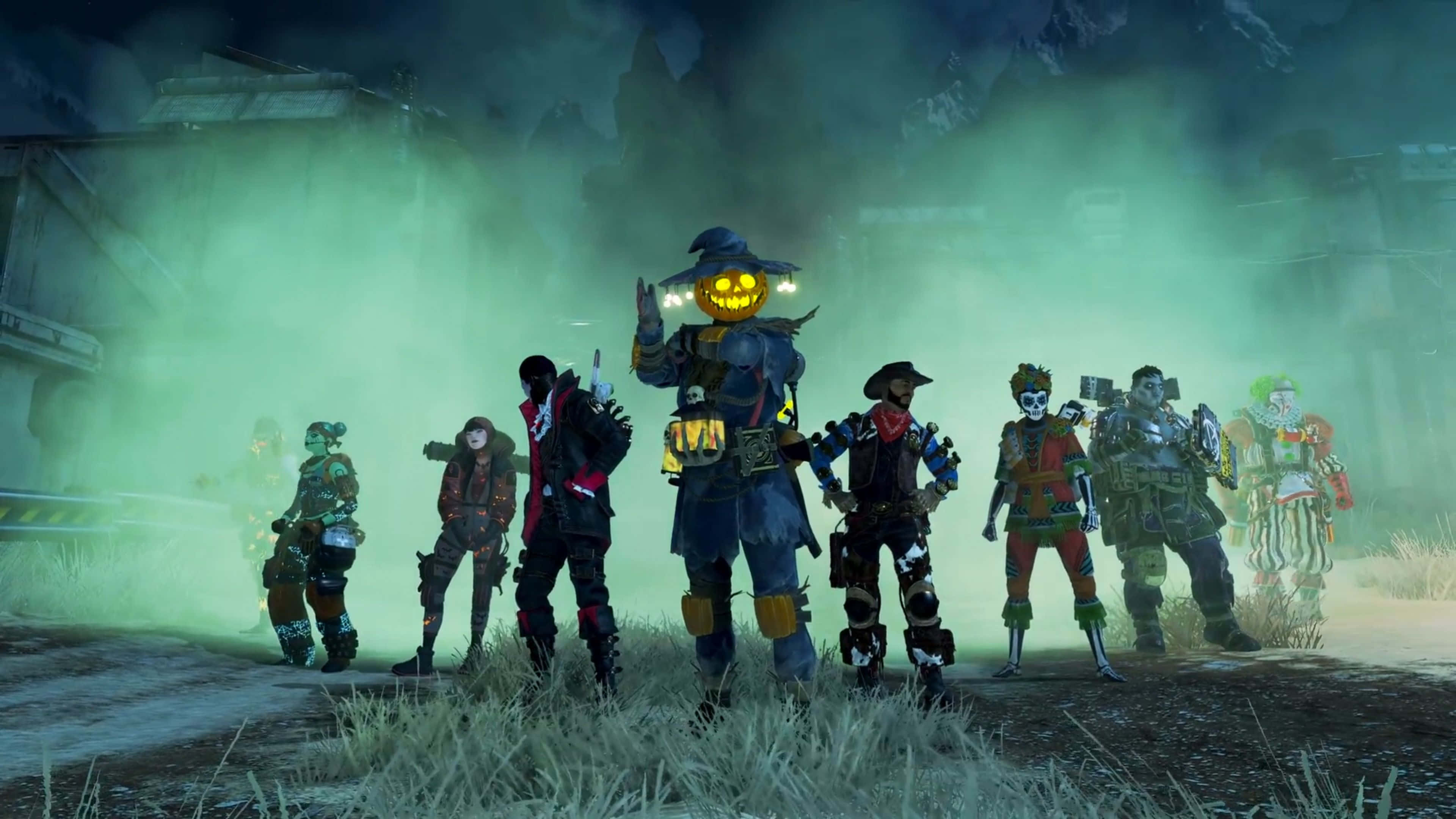 Apex Legends Crypto 桌布 壁紙 — 一群風格化的遊戲角色穿著萬聖節服裝，站在迷霧繚繞、陰森詭異的戶外場景中，散發著發光的綠色霧氣。