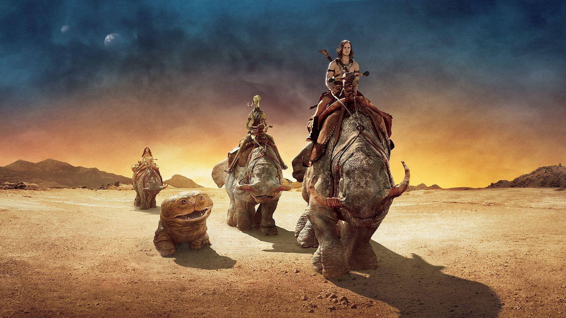 john carter 桌布 壁紙 — 一群騎手騎著巨大的裝甲野獸，在多個月亮的暮色天空下穿越荒蕪的沙漠。