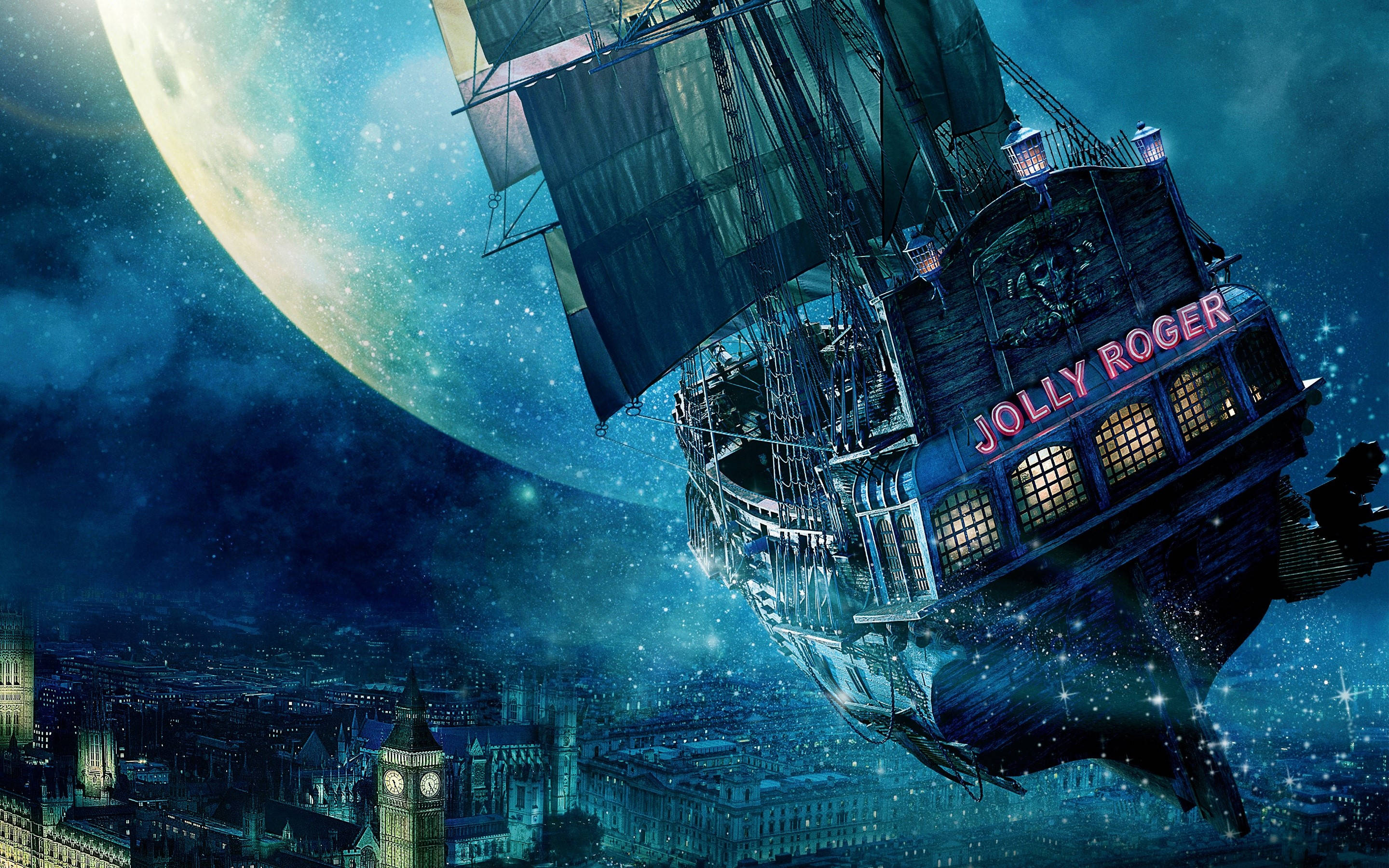 海盜船 桌布 壁紙 — 一艘名為 Jolly Roger 的發光海盜船在繁星點點的夜空中航行，背景是一座城市和一輪巨大的月亮。