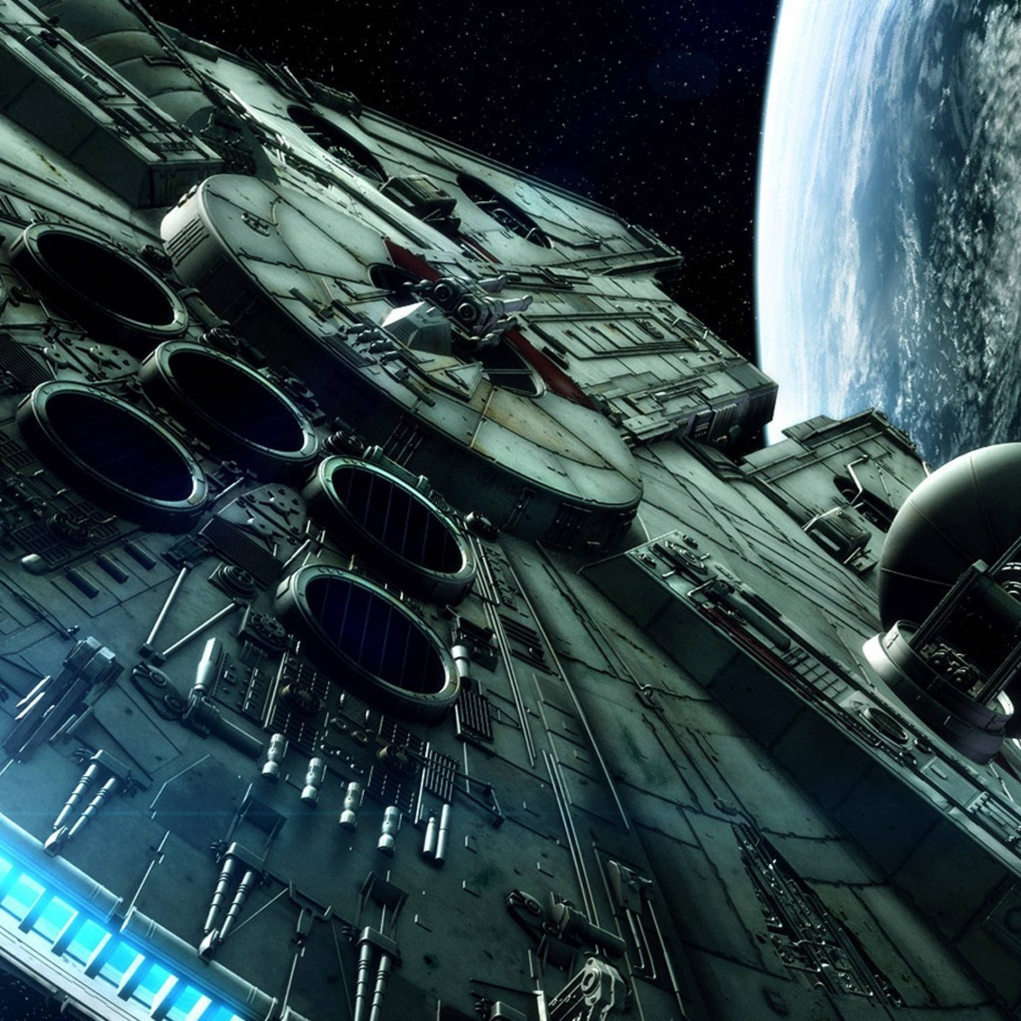 Star Wars iPad 桌布 壁紙 — 一艘巨大的星際飛船在星空下若隱若現，遠處有一顆藍色行星彎曲。