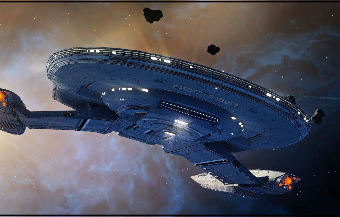 Starship 桌布 壁紙 — 一艘帶有NCC-1701標記的藍色星艦在色彩繽紛的星雲中滑行，周圍漂浮著小行星。